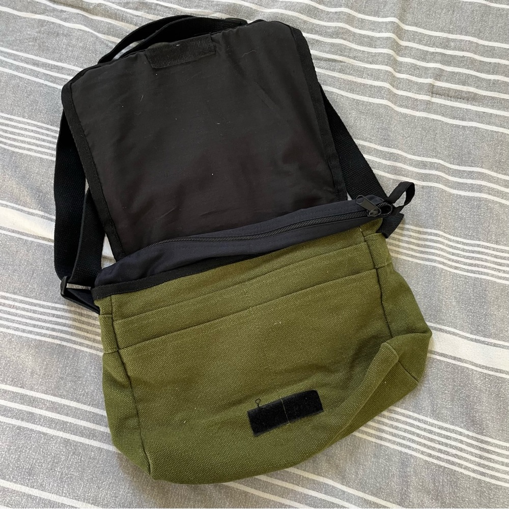 green bag with multiple pockets